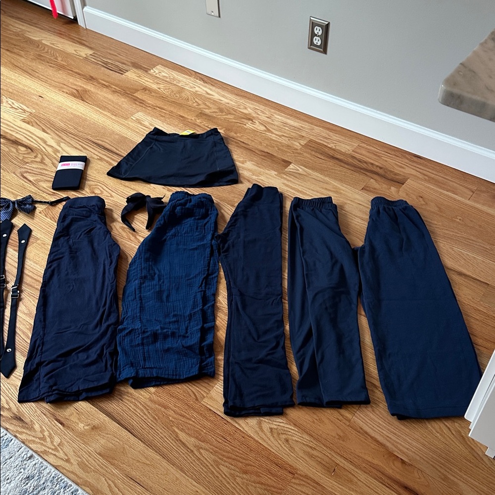 Lot of Girls 8-12 Navy uniforms- 5 pants, 1 skort, 3 ties, 1 headband, 1 tights